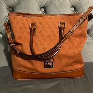 Dooney & Bourke burnt orange signature letter fabric and leather bag.